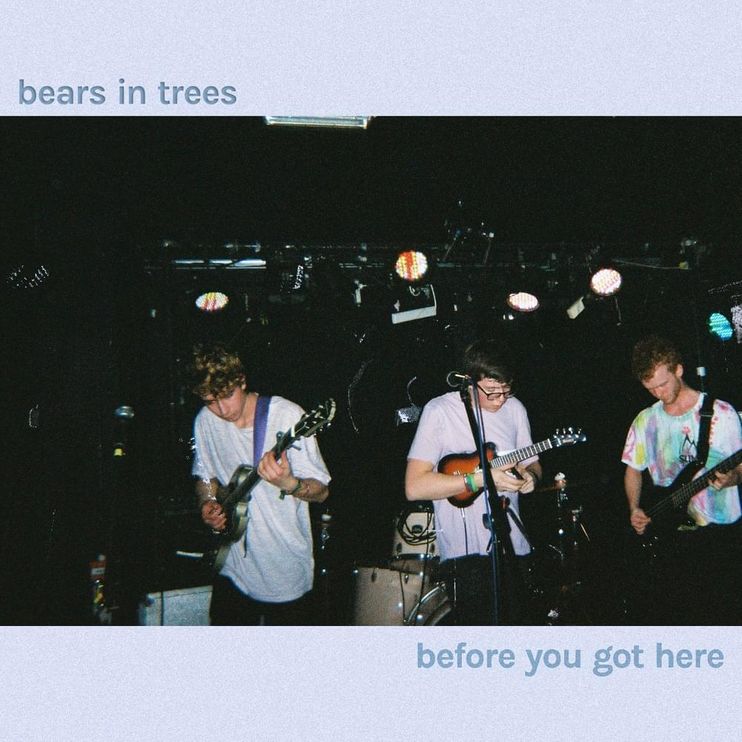 the album cover of "before you got here". it shows tba. when you hover the image, it has a greyscale filter and the album title is visible on it. clicking on this image will take you to a page with more info!