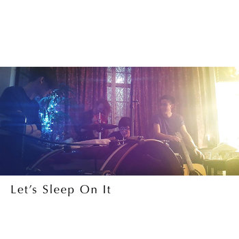 the album cover of "lets sleep on it". it shows tba. when you hover the image, it has a greyscale filter and the album title is visible on it. clicking on this image will take you to a page with more info!