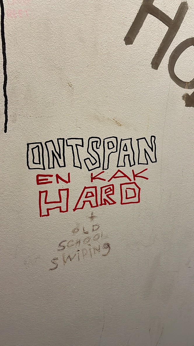 Writing in red and black marker and pencil.