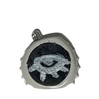 An off-white pin, with a white eye on a black background.