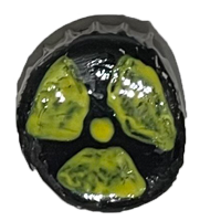 A black pin with a yellow radioactive sign on it.